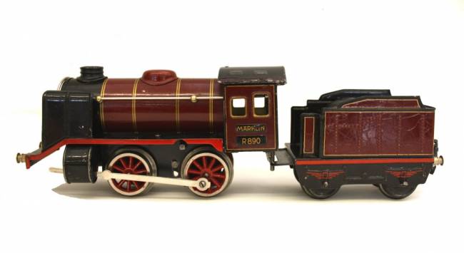 Märklin R 890, Dampflokomotive, Uhrwerk, 2-achsig, rot, mit 2-achsigem, rotem Tender