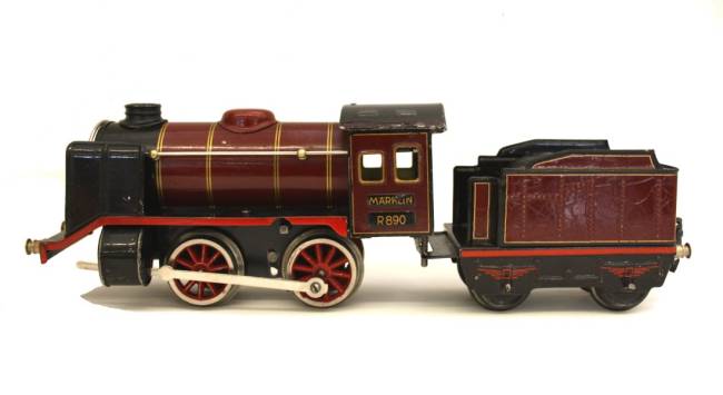 Märklin R 890, Dampflokomotive, Uhrwerk, 2-achsig, rot, mit 2-achsigem, rotem Tender