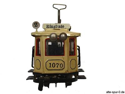 Märklin, Uhrwerksstraßenbahn, 2-achsig, beige, mit beweglichem Pantographen Märklin, Uhrwerksstraßenbahn, 2-achsig, beige, mit beweglichem Pantographen